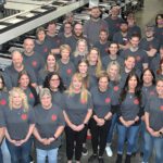 Steinhauser team at the ribbon cutting for an MPS flexographic press in 2022.